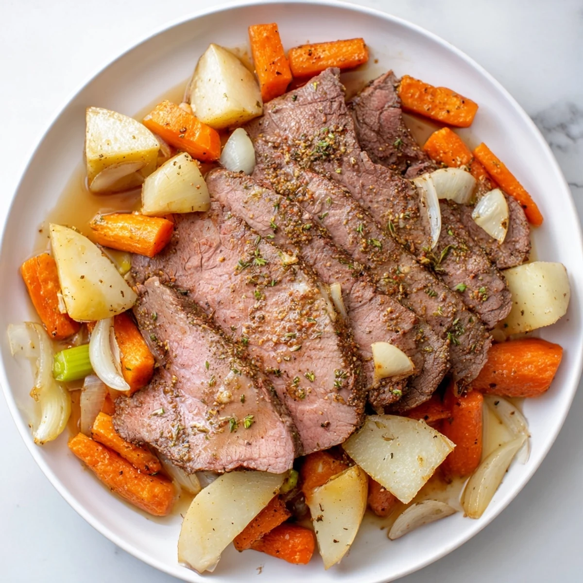 Tender beef roast, glistening, surrounded by roasted vegetables, ready for a hearty Sunday dinner.