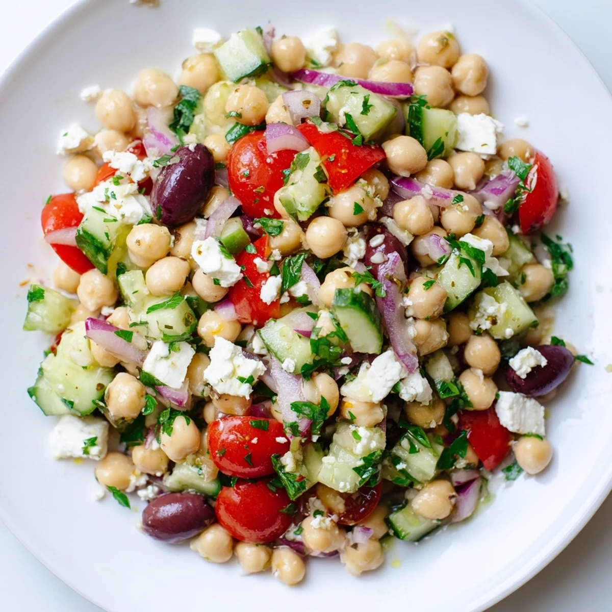 Close-up of Mediterranean Chickpea Salad with Feta, a delicious, refreshing vegetarian dish.